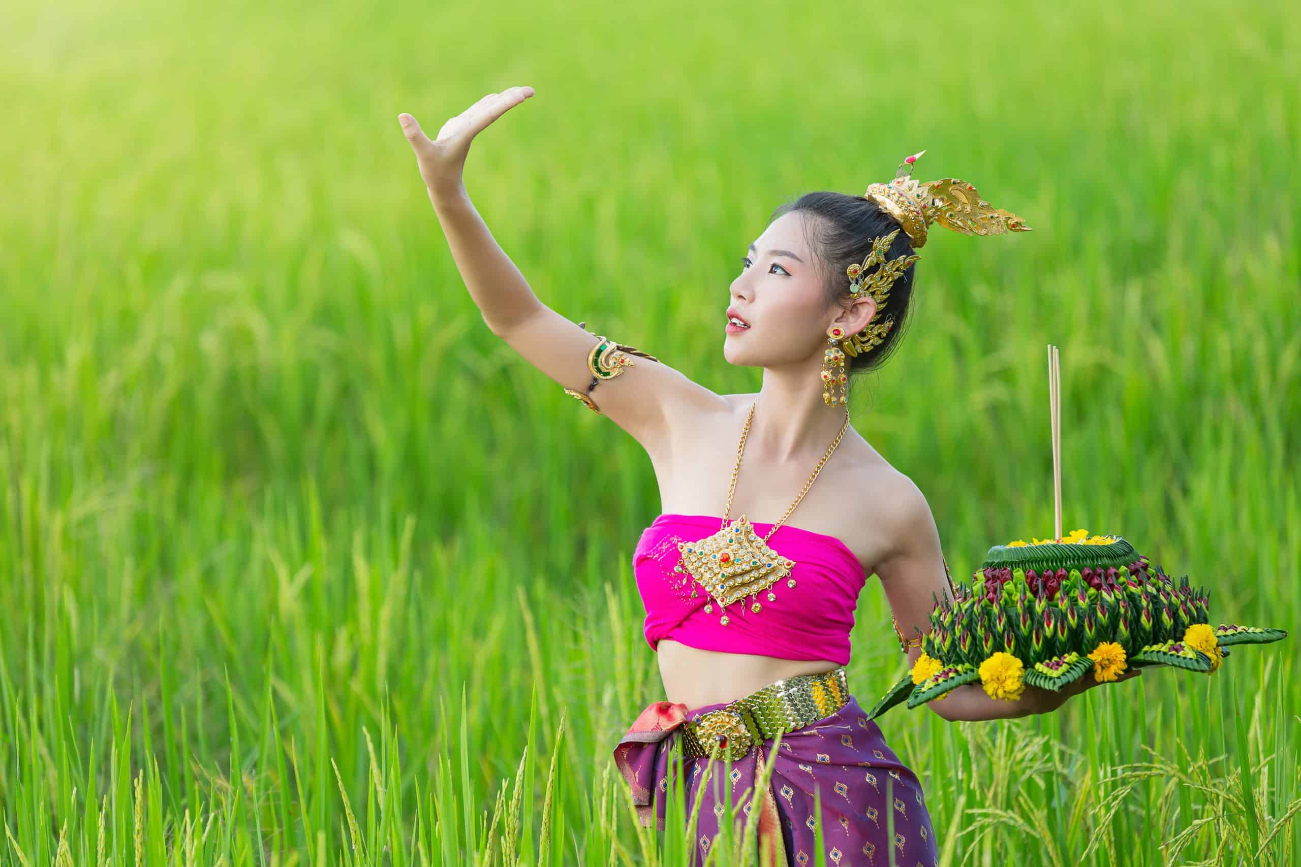 Asia woman in Thai dress traditional hold kratong. Loy krathong festival